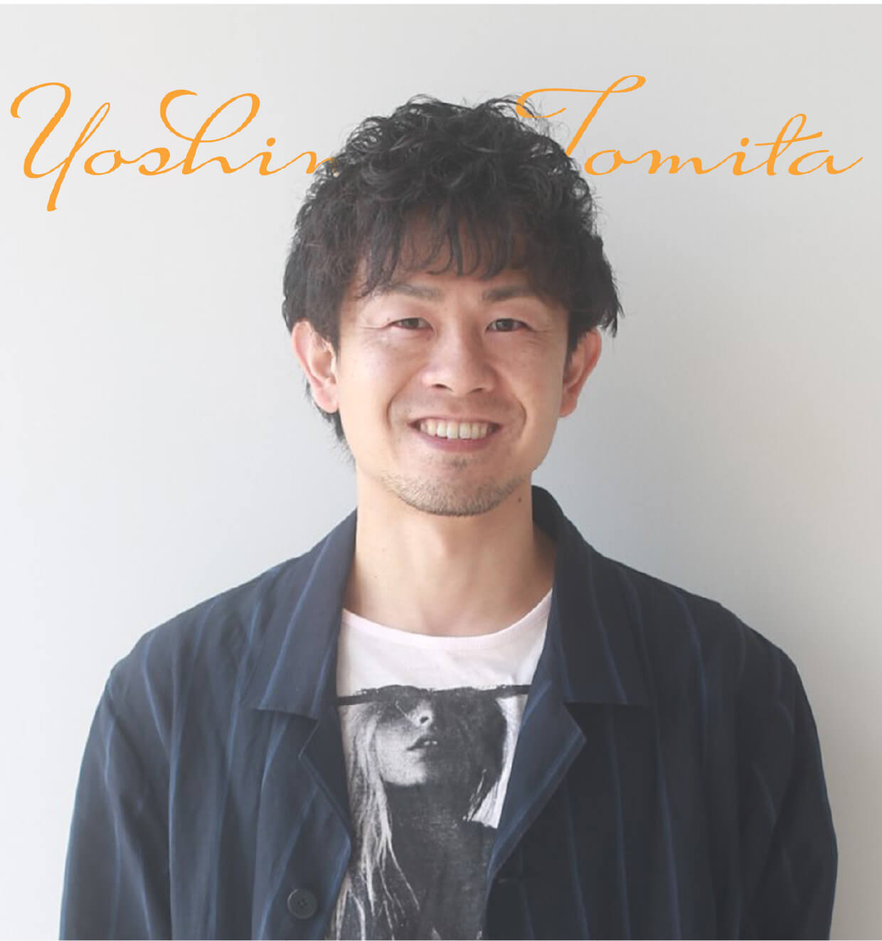 代表 富田吉則